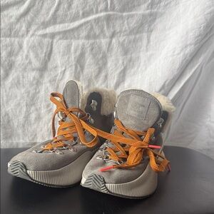 Sorel Charcoal Boots with Vibrant Orange Laces